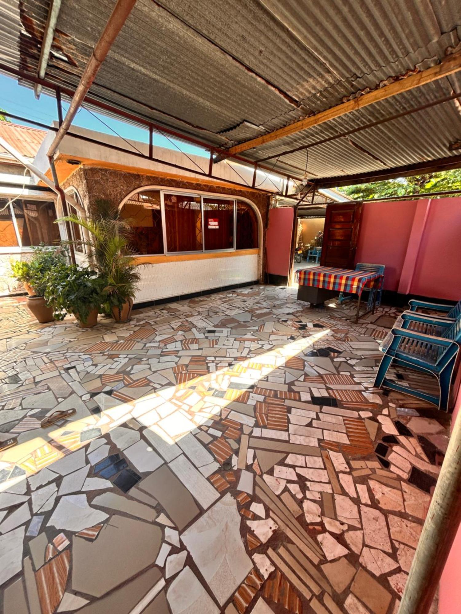 Bed and Breakfast Tanpak Gardens Bnb Дар-эс-Саламе Экстерьер фото